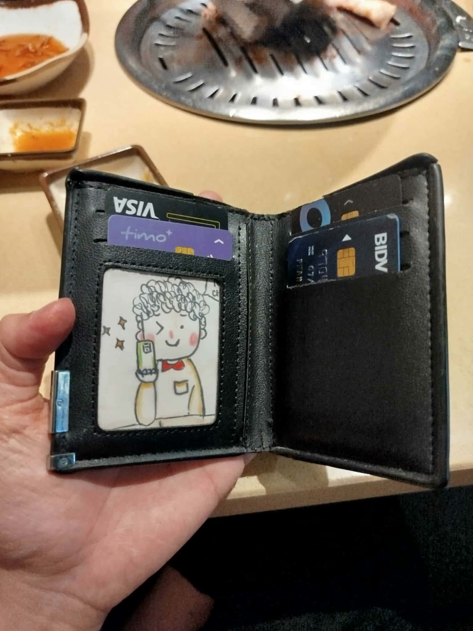 Tìm ví, giấy tờ Phạm Tấn Lộc rơi ở Sài Gòn 