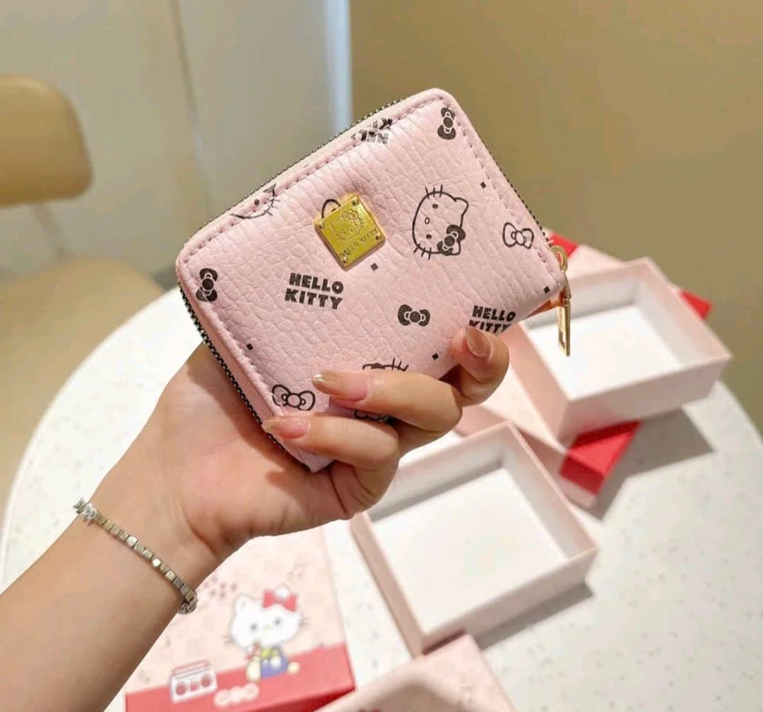 Ví da màu hồng hello kitty cccd trần vũ huyền dương ở bình dương cũ gần siêu thị coop mart